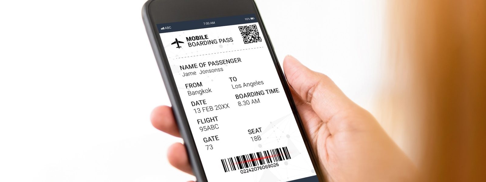 Passenger looking at electronic boarding pass on smartphone scre